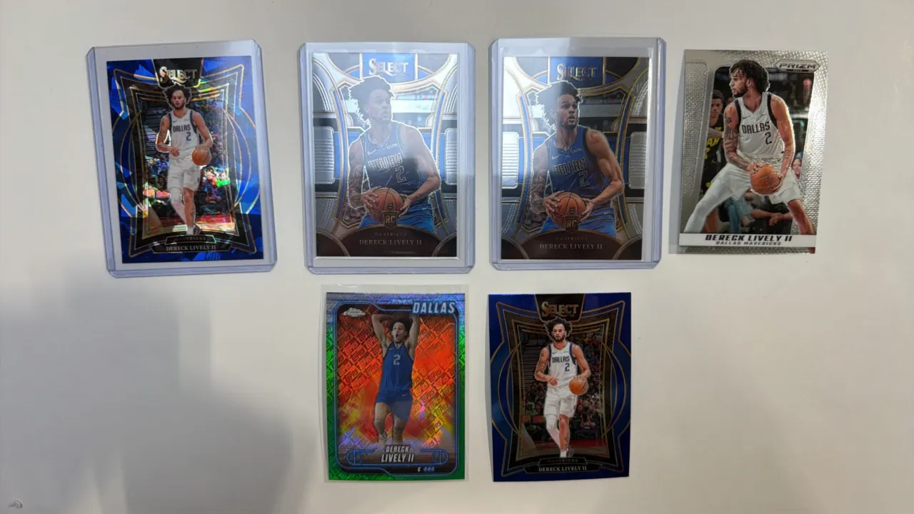 A Collection of (6) Dereck Lively II Basketball Trading Cards. (Panini/Topps, 2023-2024) Includes (4) Panini Select, (1) Panini Prizm, and (1) Topps C