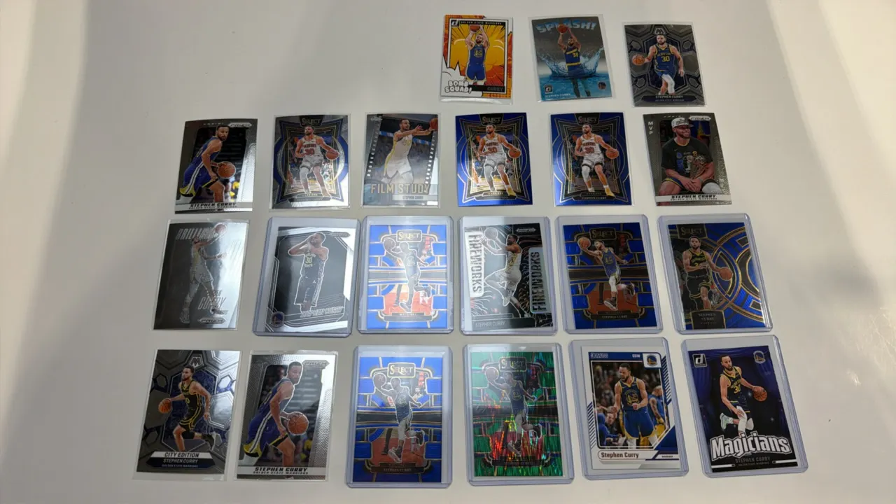 A Collection of (21) Stephen Curry Basketball Trading Cards. (Panini, 2020s) An assortment of (21) Stephen Curry cards from Panini Prizm, Select, Mosa