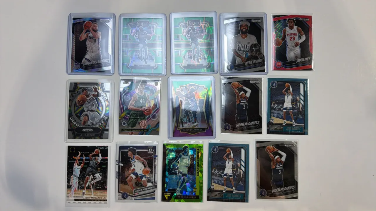 A Collection of (15) Assorted NBA Trading Cards. (Panini, 2020s) Featuring players including Jaden McDaniels, Kyrie Irving, Domantas Sabonis, Allen Iv