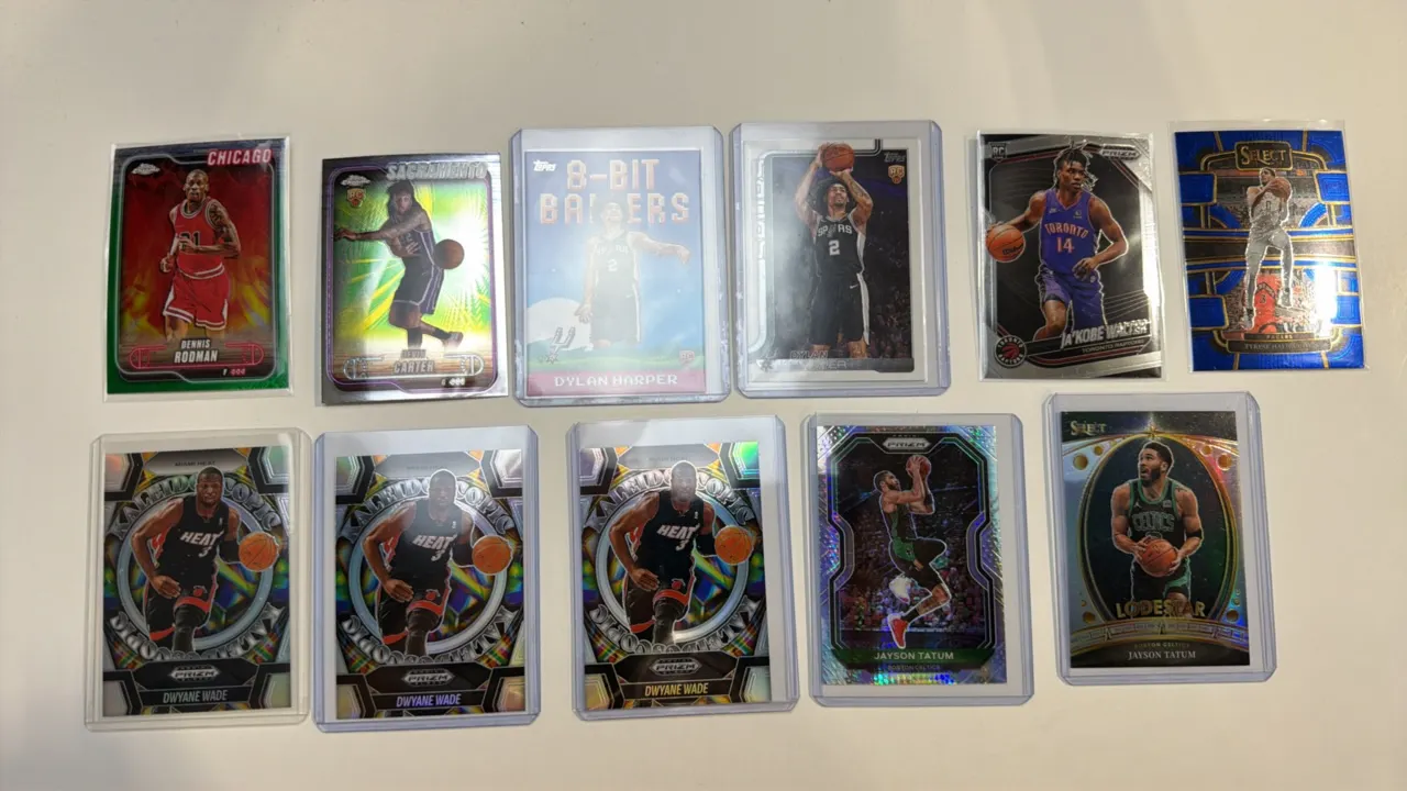 A Collection of (11) Assorted NBA Trading Cards. (Panini/Topps, Modern) Includes (2) Dylan Harper RC, Devin Carter RC, Dennis Rodman, Ja'Kobe Walter R