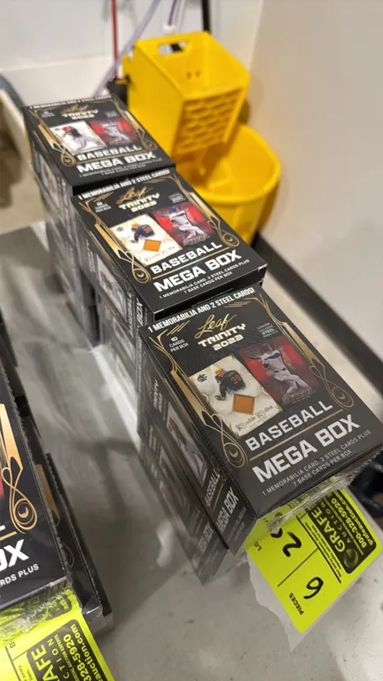 A 2023 Leaf Trinity Baseball Mega Box. (Leaf, 2023) A factory-sealed mega box containing 10 cards, including one memorabilia card, two steel cards, an