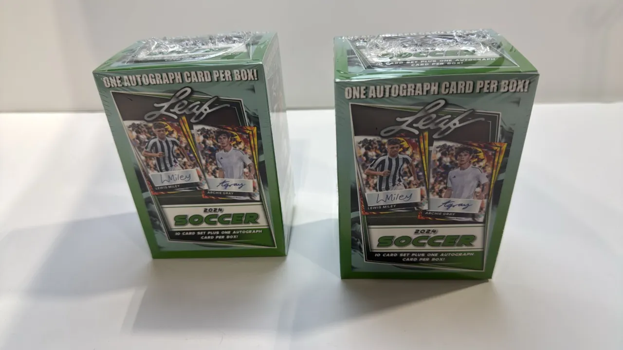 A Pair of 2024 Leaf Soccer Factory-Sealed Trading Card Boxes. (Leaf, 2024) Factory-sealed trading card boxes, each containing a 10-card set plus one a