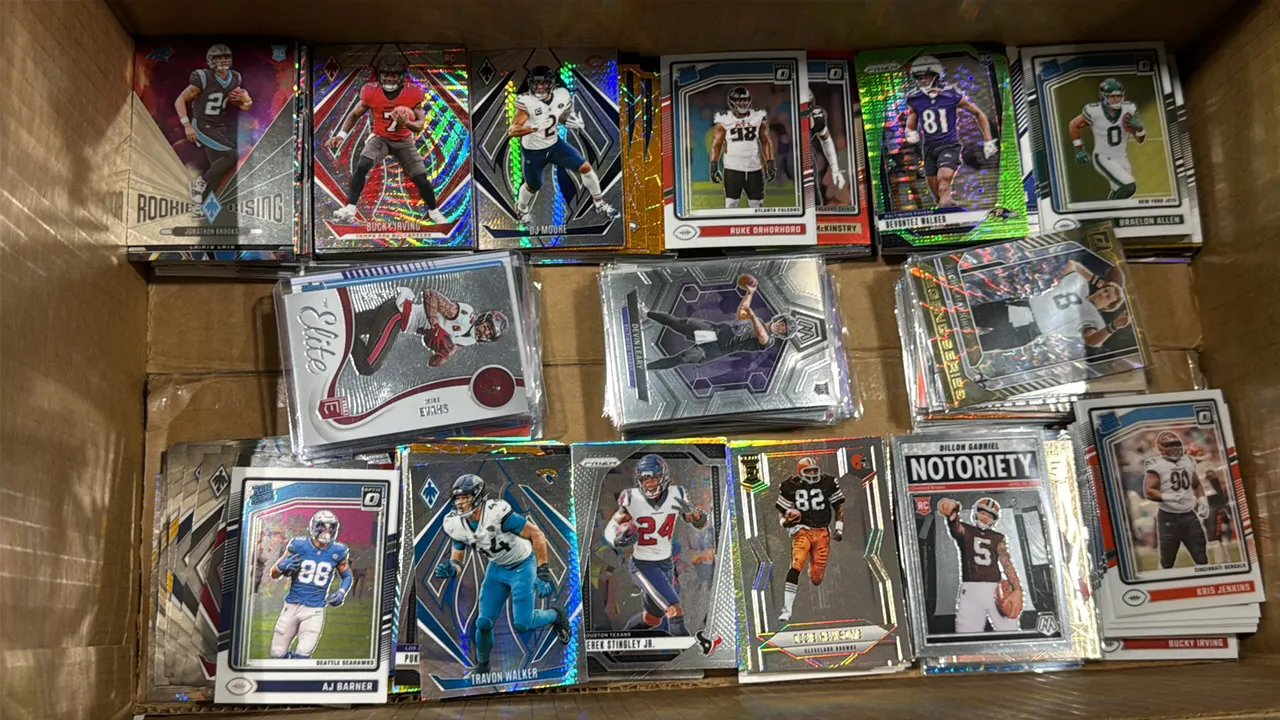 A Collection of Panini Football Trading Cards. (Panini, 2020s) A collection of assorted NFL trading cards across product lines including Donruss Optic