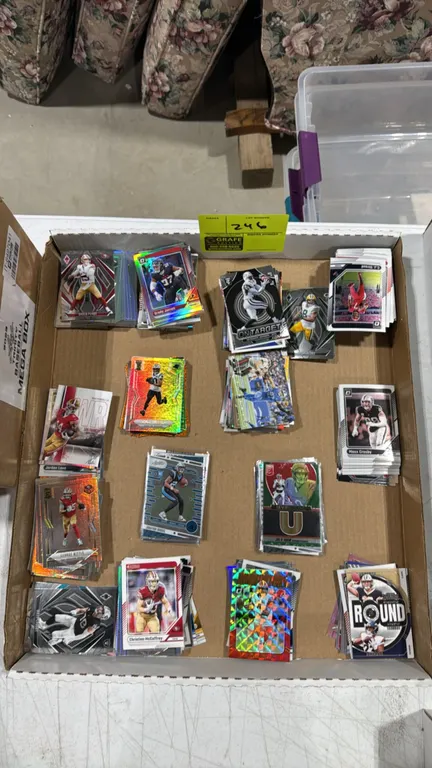 A Collection of Panini Football Collector Cards. (Panini, 2020s) An assortment of football trading cards across Donruss, Optic, Elite, Absolute, Phoen