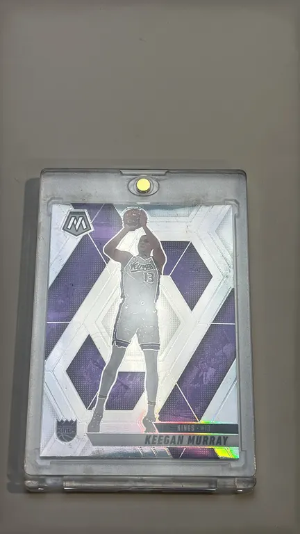A Keegan Murray Panini Mosaic Trading Card. (Panini, 2024-25) A 2024-25 Panini Mosaic Basketball No. 57 trading card featuring Keegan Murray of the Sa