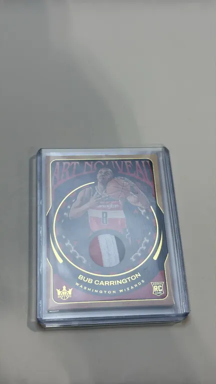 A Bub Carrington Panini Court Kings "Art Nouveau" Rookie Card. (Panini, 2024-25) A Washington Wizards rookie card featuring an inset memorabilia swatc