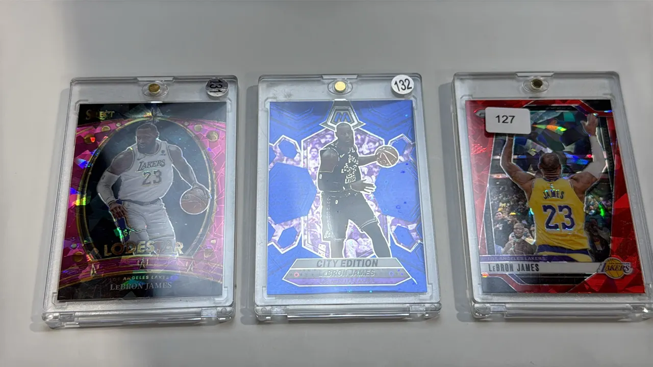 A Collection of LeBron James Basketball Cards. (Panini, 2023-2025) A collection of (3) cards including 2024-25 Prizm No. 130, 2023-24 Select Lodestar