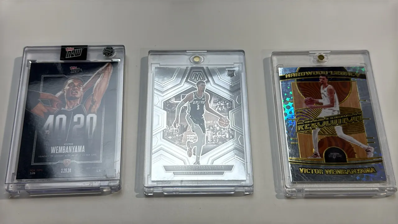 A Collection of Victor Wembanyama Basketball Cards. (Panini/Topps, 2023-2025) A 3-card collection including 2023-24 Panini Mosaic RC #238, 2023-24 Top