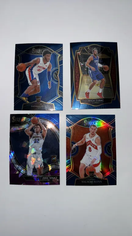 A Set of 2020-21 Panini Select Basketball Cards. (Panini, 2020-21) A collection of (4) cards including Saddiq Bey No. 79 (Concourse RC), Ivica Zubac N