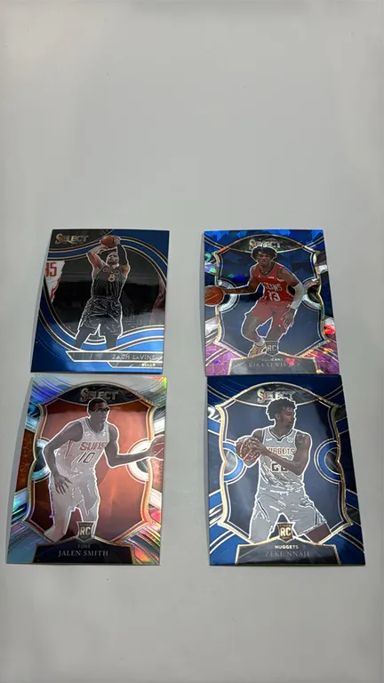 A Collection of 2020-21 Panini Select Basketball Cards. (Panini, 2020-2021) A lot of (4) cards featuring Zach LaVine (No. 239 Courtside), Kira Lewis J