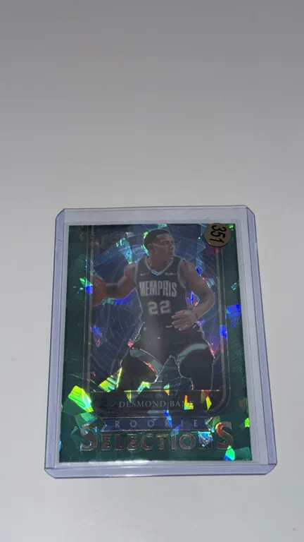 A Desmond Bane Panini Select Rookie Selections Trading Card. (Panini, 2020-21) Card No. 28 featuring Memphis Grizzlies guard Desmond Bane with a green