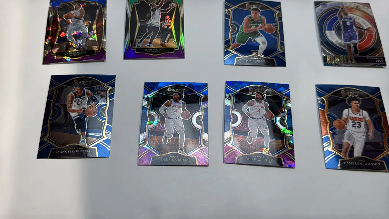 A Collection of 2020-21 Panini Select Basketball Cards. (Panini, 2020-21) A lot of (8) cards featuring CJ McCollum, Josh Okogie, Josh Green (Rookie Ca
