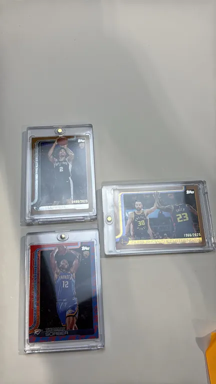 A Collection of 2025 Topps Flagship Basketball Cards. (Topps, 2025) A lot of (3) cards including Dylan Harper RC (#202, numbered 0488/2025), Thomas So