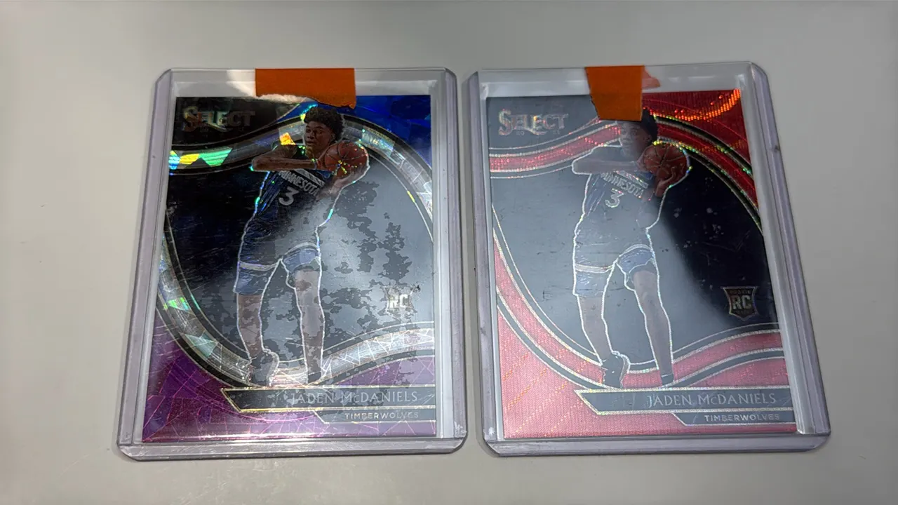 A Pair of Jaden McDaniels Rookie Basketball Cards. (Panini, 2020-21) Panini Select Courtside card #273 featuring Minnesota Timberwolves forward Jaden