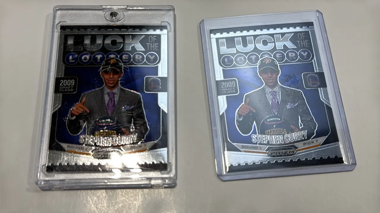 A Stephen Curry Panini Prizm Black "Luck of the Lottery" Basketball Card. (Panini, 2024-25) Features card No. 12 depicting Stephen Curry with a 2009 D