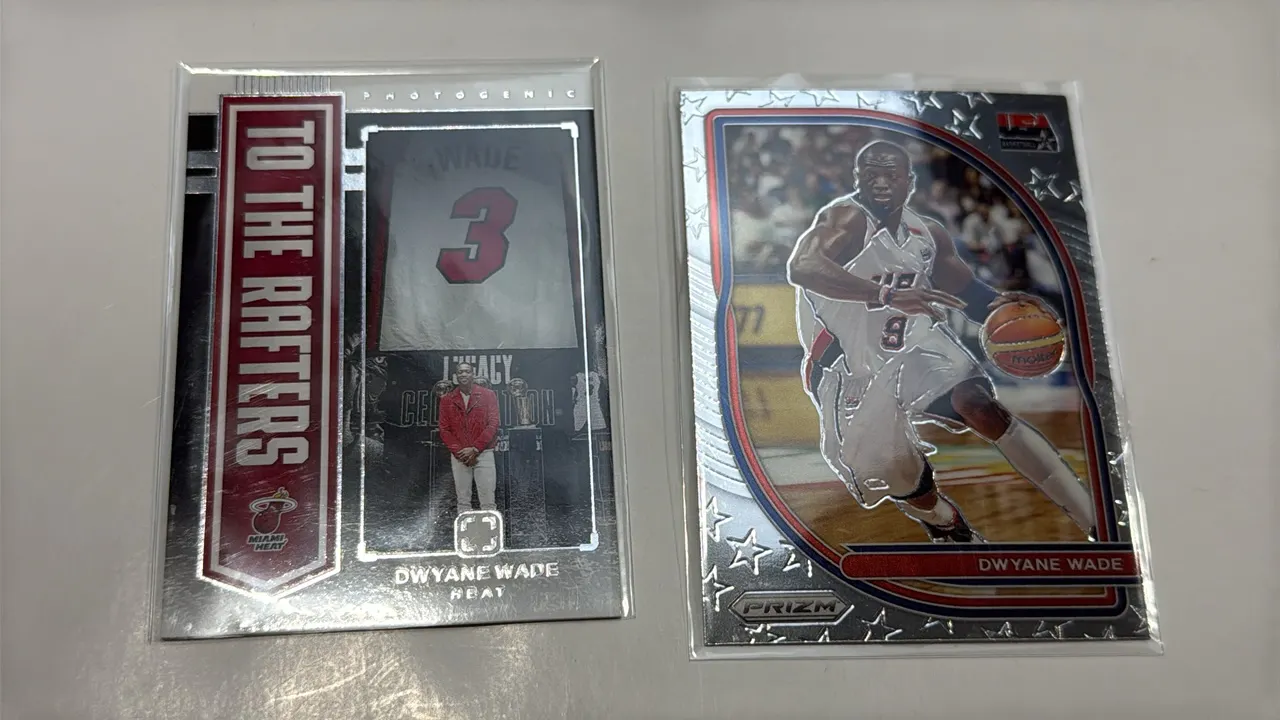 A Collection of (2) Panini Dwyane Wade Basketball Cards. (Panini, 2020-2025) A pair of trading cards featuring Dwyane Wade, including a 2024-25 Panini
