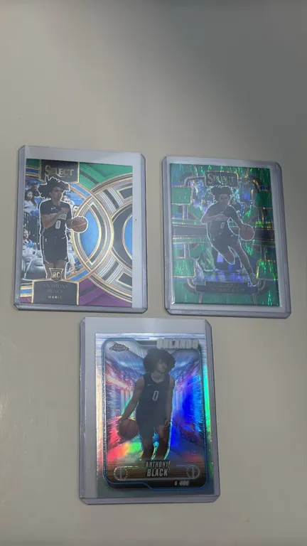 A Collection of (3) Anthony Black Basketball Cards. (Panini/Topps, 2023-2025) Featuring Orlando Magic guard Anthony Black. Includes a 2023-24 Panini S