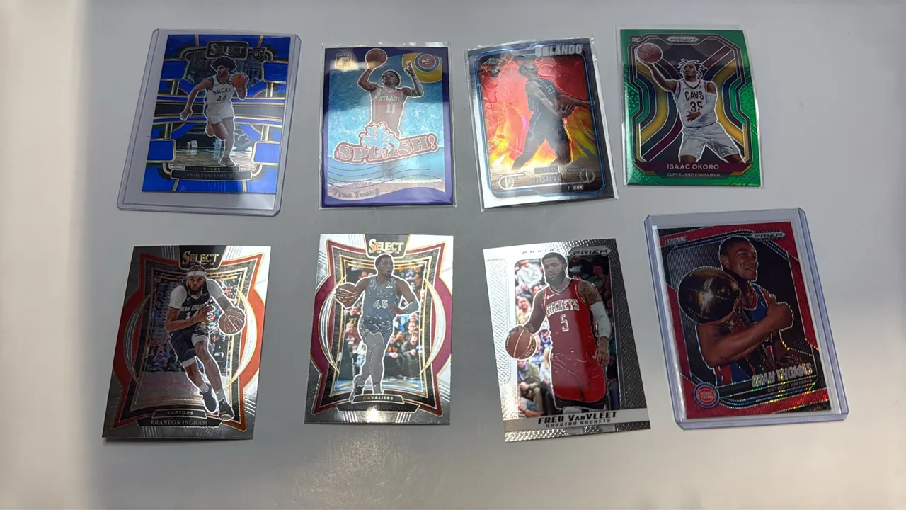 A Collection of (8) Assorted NBA Basketball Cards. (Panini/Topps, 2020-2024) A set of 8 cards including Panini Select, Prizm, Optic, and Topps Chrome.