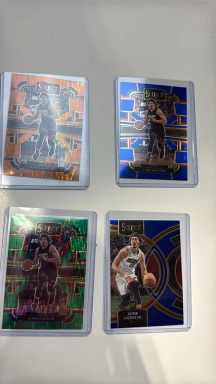 A Collection of Jaime Jaquez Jr. Rookie Cards. (Panini, 2023-24) A 4-card lot of Panini Select Jaime Jaquez Jr. rookie cards, including (3) No. 100 Co