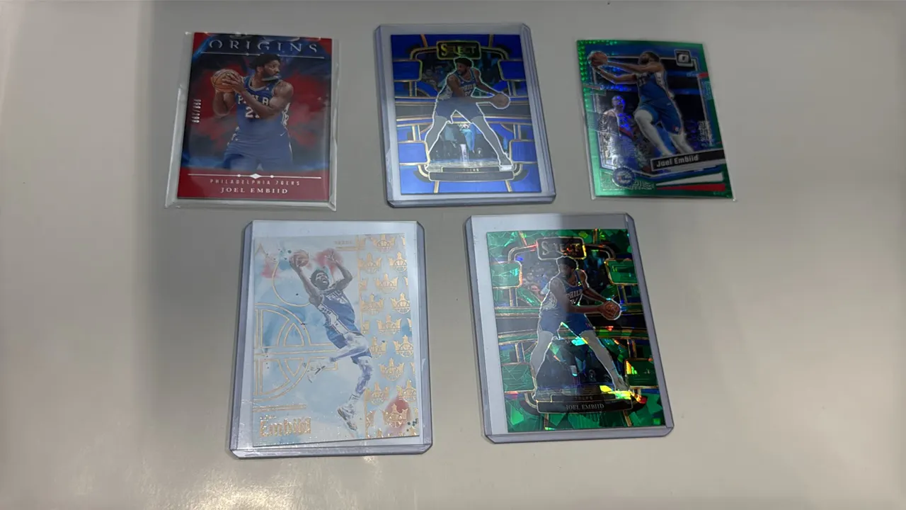 A Collection of (5) Joel Embiid Basketball Cards. (Panini, 2023-2025) Includes 2024-25 Origins No. 40 (098/299), 2024-25 Court Kings No. 19, 2023-24 S