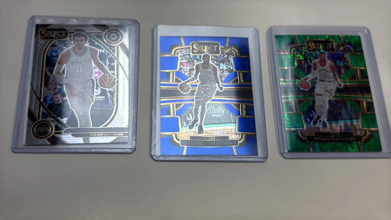A Collection of (3) Victor Wembanyama Panini Select Basketball Cards. (Panini, 2023-2025) Includes a 2024-25 No. 229 Courtside card and (2) 2023-24 No
