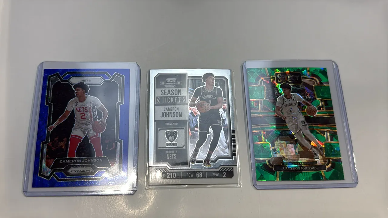 A Collection of Cameron Johnson Basketball Cards. (Panini, 2023-2024) A set of (3) cards including Select No. 12 Green Prizm Concourse, Contenders Opt