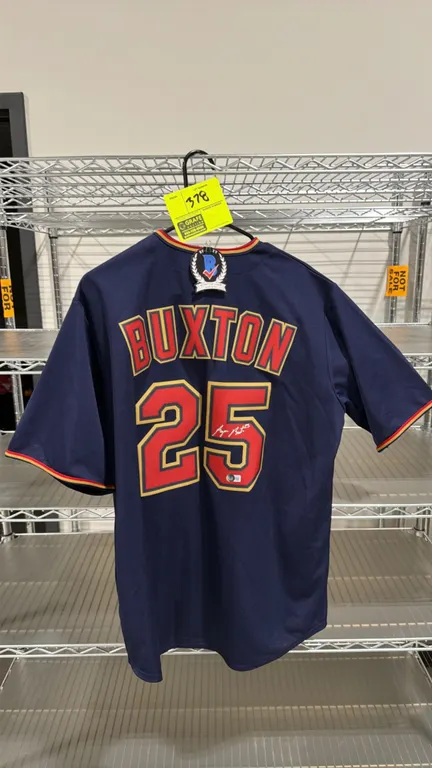 A Byron Buxton Autographed Minnesota Twins Jersey. (Nike, 2020s) A navy blue Minnesota Twins jersey signed by Byron Buxton on the back number 25 in si