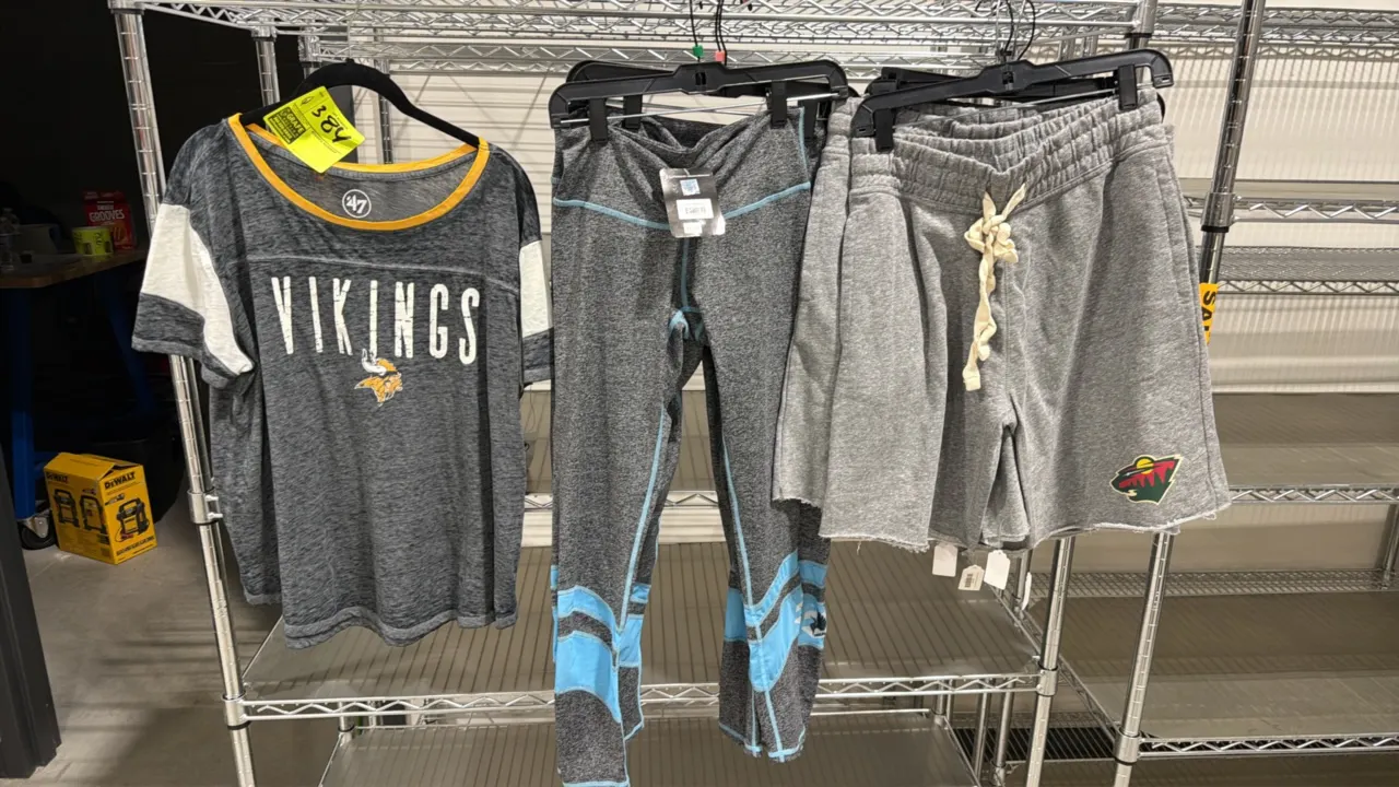 Minnesota sports apparel lot. Includes (1) '47 Brand Minnesota Vikings shirt (Medium), (3) pairs of Minnesota United FC leggings (2 Small, 1 Large) wi