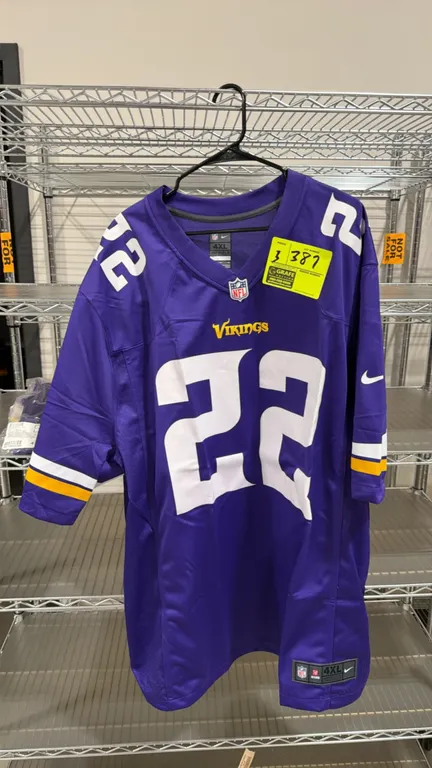 Nike Minnesota Vikings Harrison Smith #22 On-Field football jerseys. Features player name and numbers, mesh side panels, white and gold accents, and N