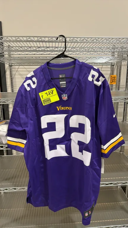 Nike On-Field Minnesota Vikings Harrison Smith jerseys. Features screen-printed #22 on front, back, and shoulders with 'SMITH' nameplate on back. Purp