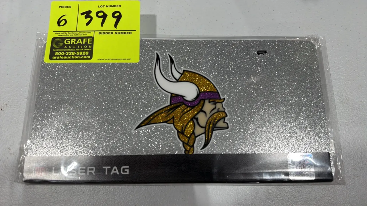 Rico Industries LZNSL9101 Minnesota Vikings laser tag license plates. Features silver glitter finish with team logo. Durable acrylic construction for
