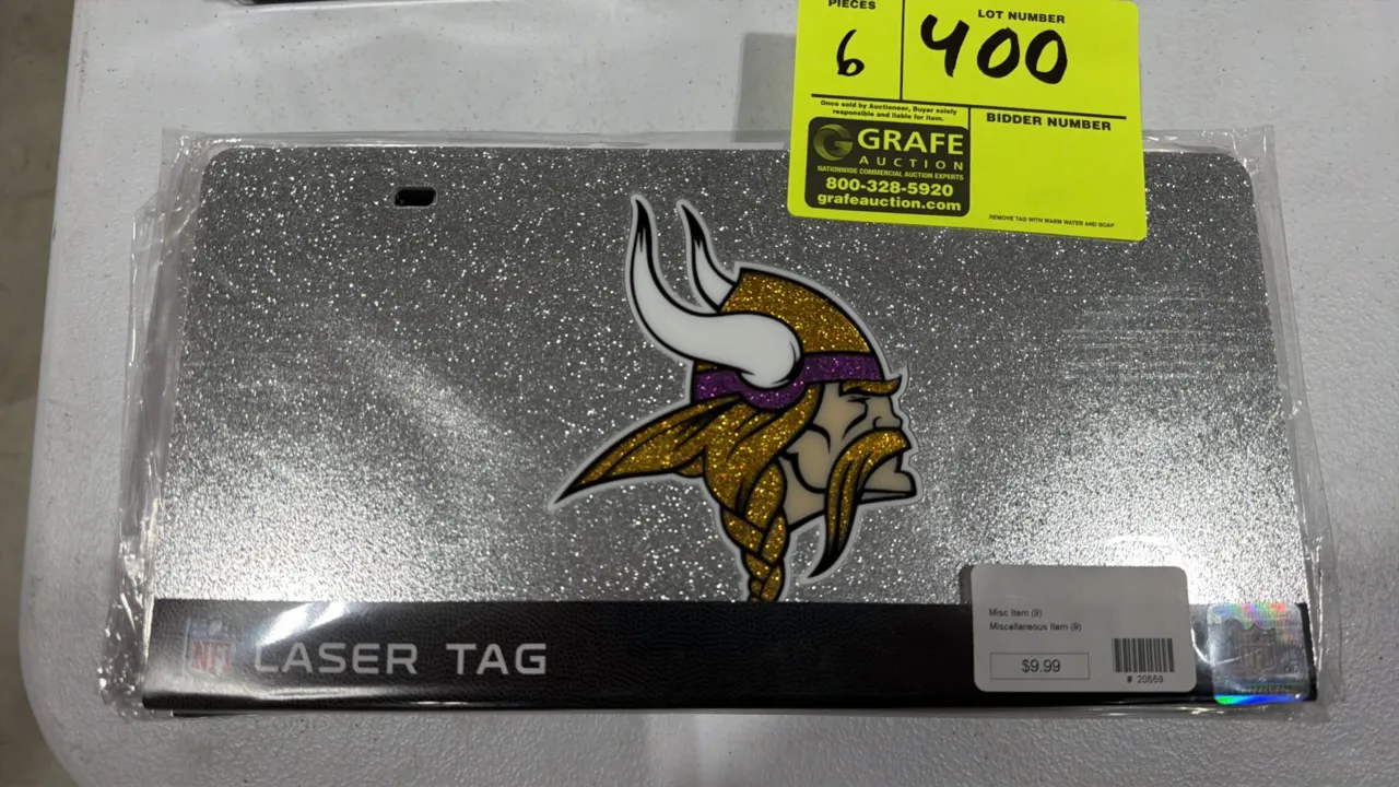 Laser Tag Minnesota Vikings acrylic license plates. Features durable acrylic construction with a glitter-finish team logo. Designed for indoor or outd