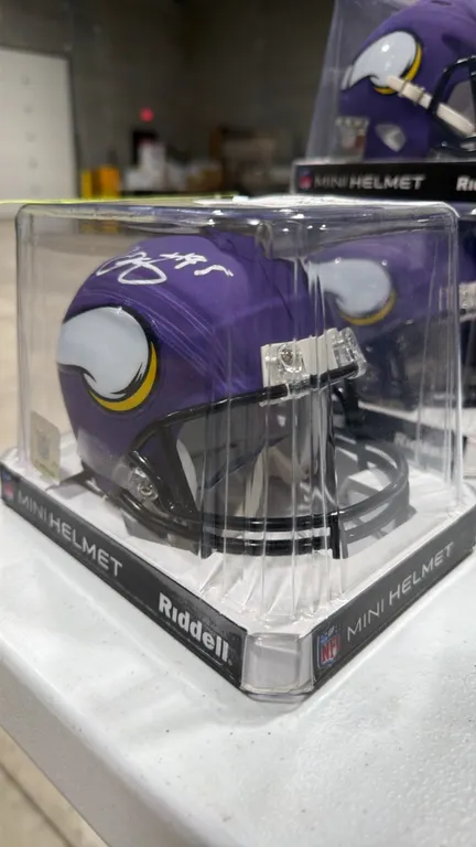 An Ifeadi Odenigbo Signed Minnesota Vikings Mini Football Helmet. (Riddell) A Minnesota Vikings mini football helmet hand-signed by Ifeadi Odenigbo in