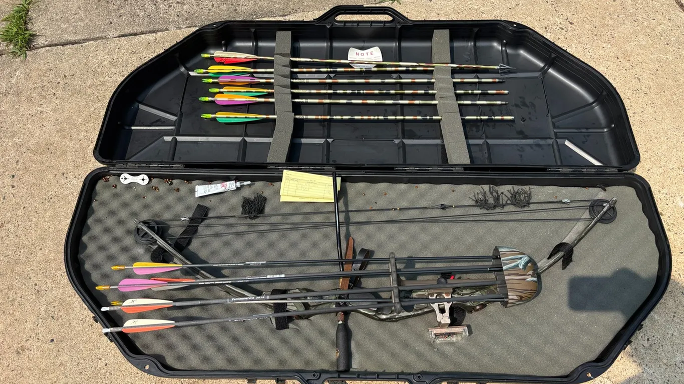 Bear Compound Bow, Arrows, and Hard Case