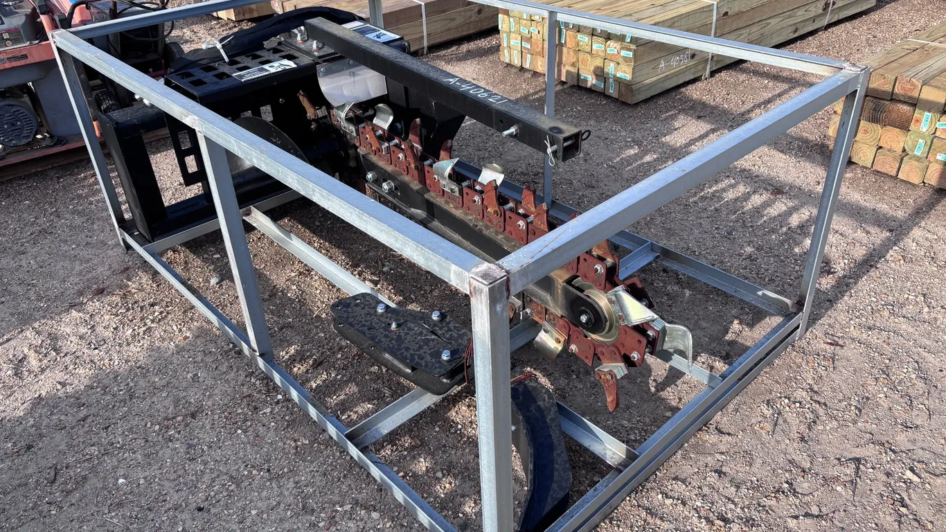 TRENCHER AND HOE ATTACHMENT FOR SKID STEER LOADER