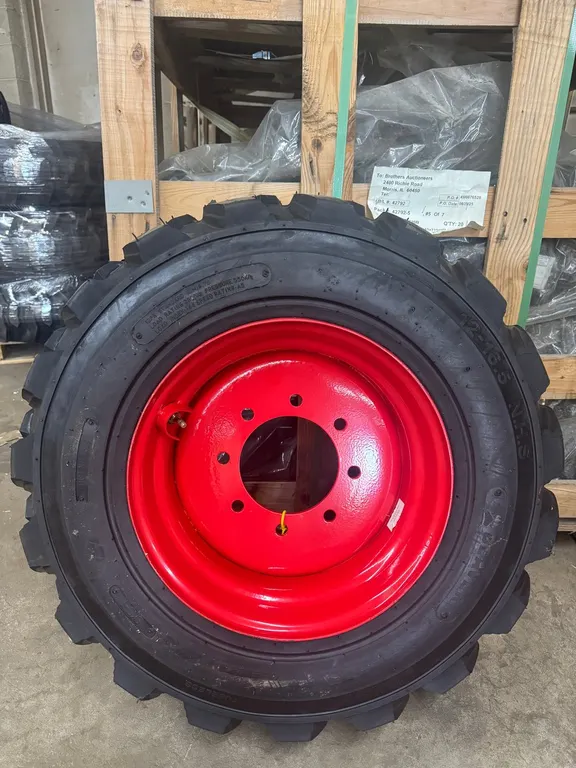 (2 TIRES) NEW 12x16.5 HEAVY DUTY SKID STEER TIRE WITH RIMS
