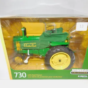 1/16 ERTL PRESTIGE COLLETION JD 730 W/HEAT HOUSER