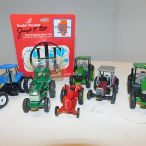 1/64 LOT OF 7 MISC TRACTORS
