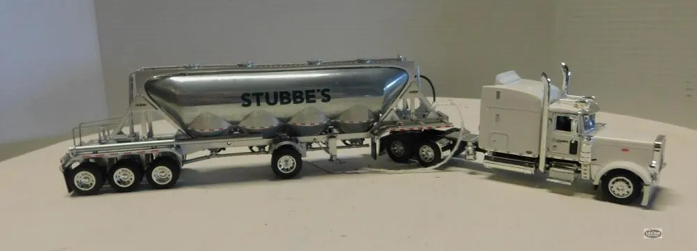 1/64 DCP PETERBILT W/PNEUMATIC TANK, STUBBES, CUSTOM