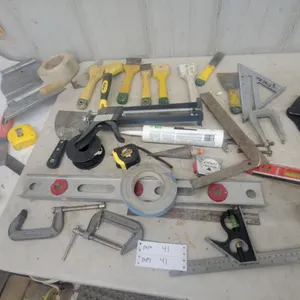 Assorted Construction and Masonry Tools: Caulk Gun, Levels, Trowels, Clamps, Tape Measures