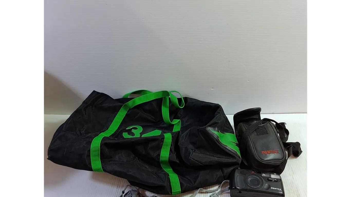 Pentax Zoom 600x Camera Untested, Duffel Bag Approx 17"x8"x11"