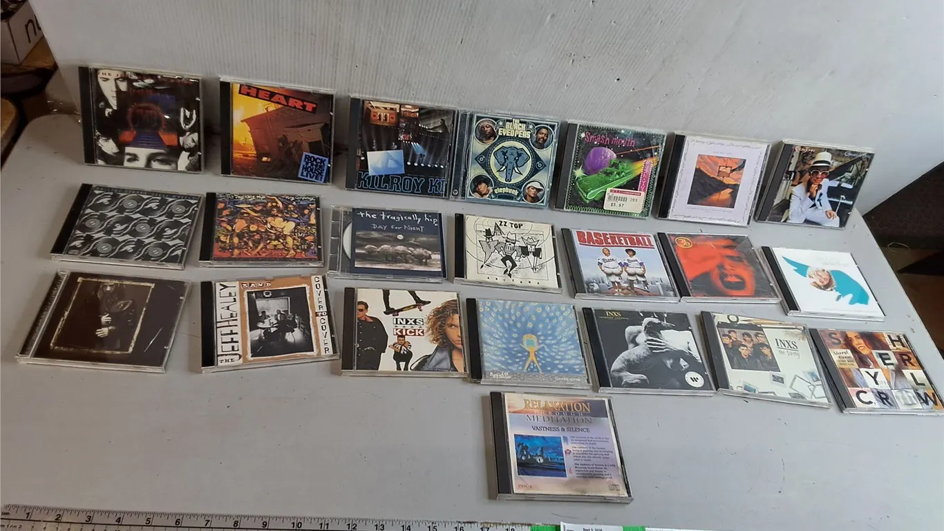 (22) CDs- Elton John, Black Eyed Peas, The Tragically Hip, Misc.