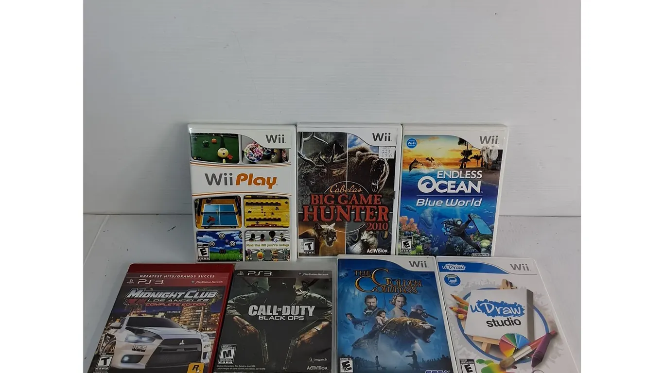 (5) Wii Games- U Draw, Endless Ocean, (2) PS3 Games- Call Of Duty, Midnight Club