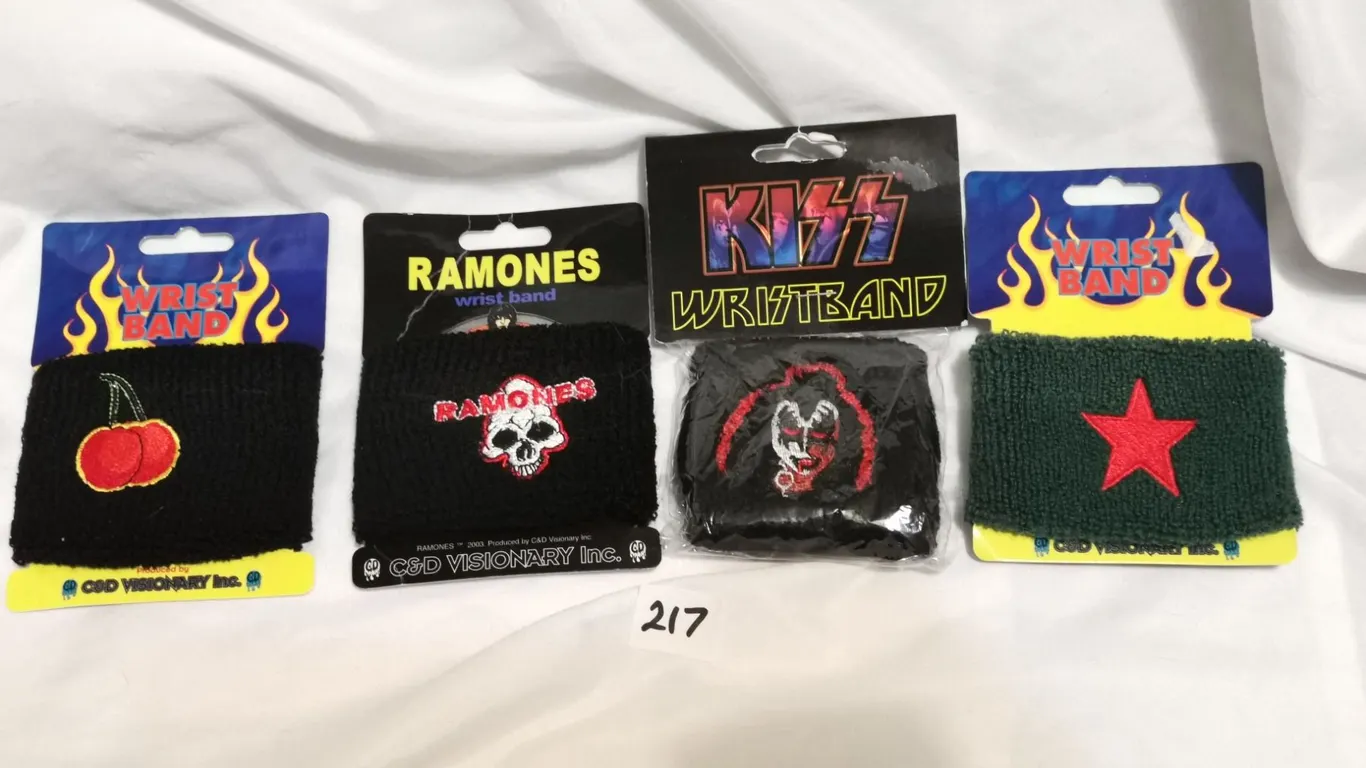 (4) NOS Wrist Bands – Kiss, Ramones, Cherry, Star