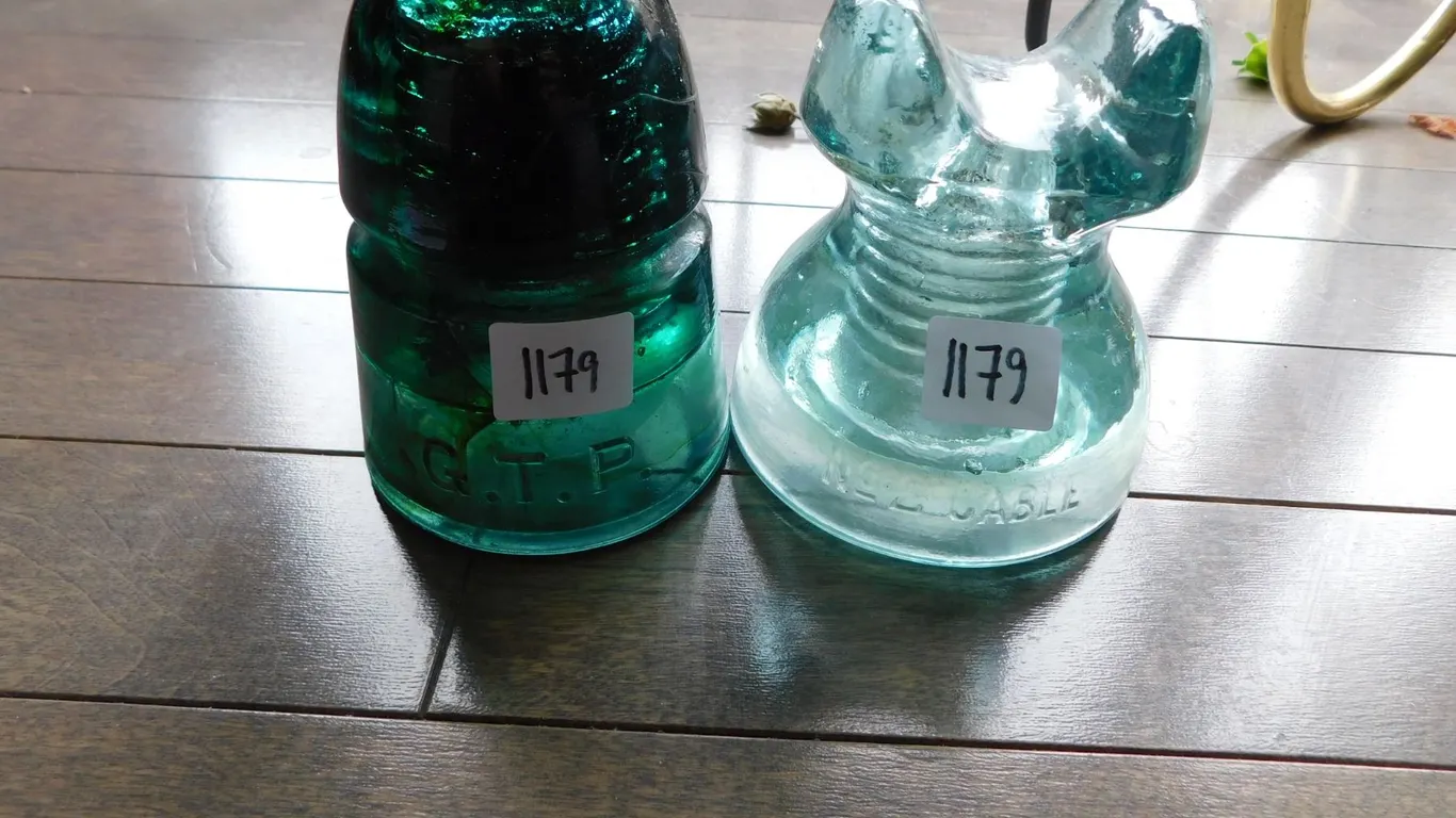 G.T.P. AND #2 CABLE MICKEY MOUSE INSULATORS