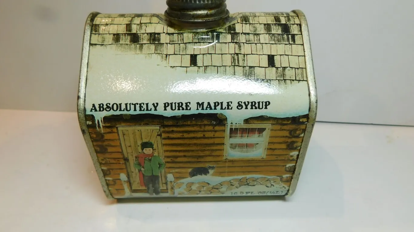 VINTAGE CABIN SHAPED MAPLE SYRUP TIN