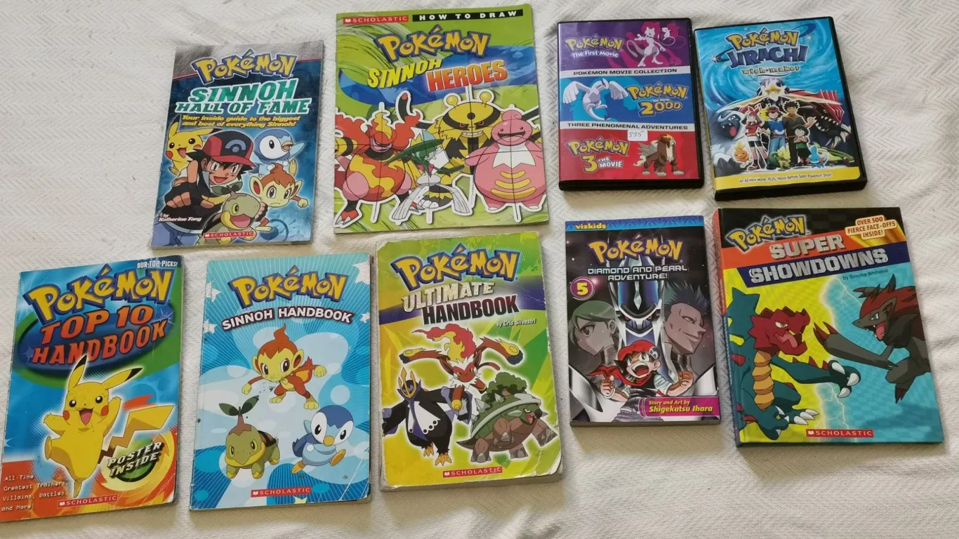 Pokemon Lot – (2) DVDs, (7) Books