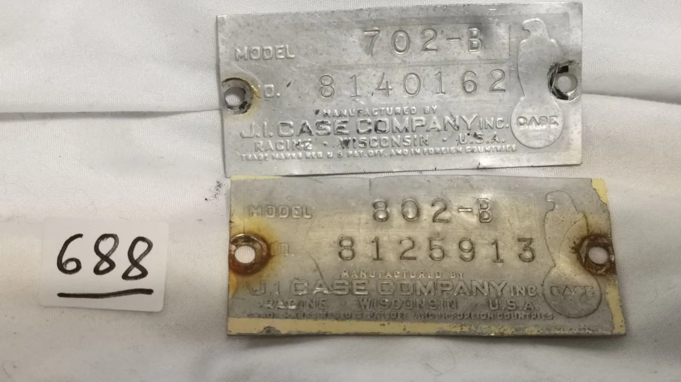Two Old Case Tractor Serial Numbers with Eagle Logos