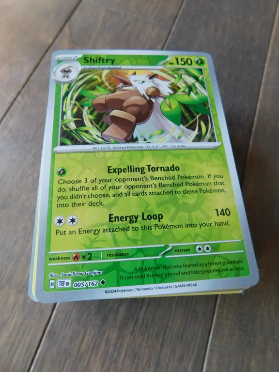 STACK OF POKEMON CARDS