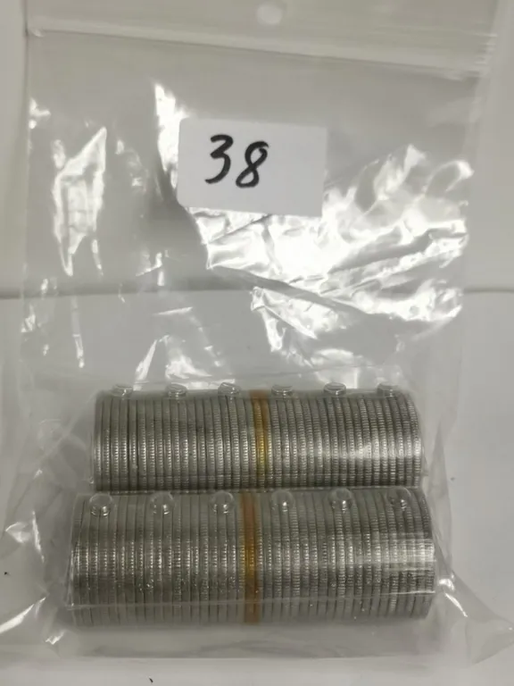 Two Full Rolls of 1973 RCMP 25 cents